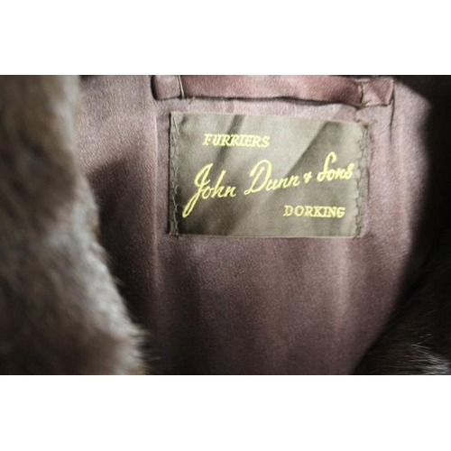 57 - TWO VINTAGE FUR COATS COMPRISING A SWING STYLE BY JOHN DUNN & SONS OF DORKING AND SHORT BOLERO STYLE... 