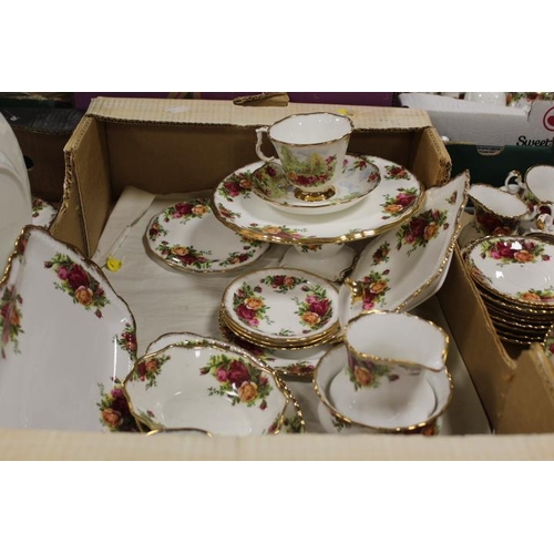 99 - FOUR TRAYS OF ROYAL ALBERT OLD COUNTRY ROSES TEA AND DINNERWARE ETC, TO INCLUDE TEA AND COFFEE POTS,... 