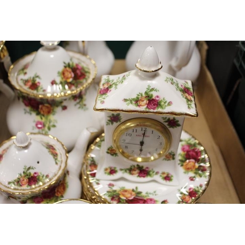 99 - FOUR TRAYS OF ROYAL ALBERT OLD COUNTRY ROSES TEA AND DINNERWARE ETC, TO INCLUDE TEA AND COFFEE POTS,... 