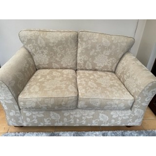 831 - A CREAM M & S TWO SEATER SOFA