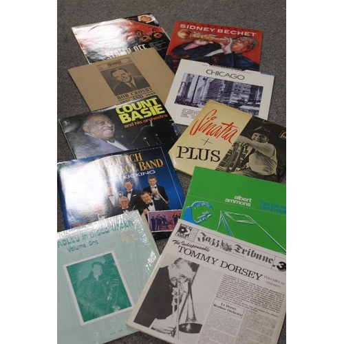 102 - A TRAY OF ASSORTED LP AND SINGLES RECORDS. MAINLY MID CENTURY JAZZ TO INCLUDE WOODY HERMAN, BENNY GO... 