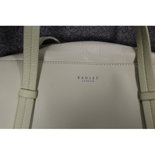 111 - A TRAY OF ASSORTED LEATHER HANDBAGS TO INCLUDE RADLEY ETC