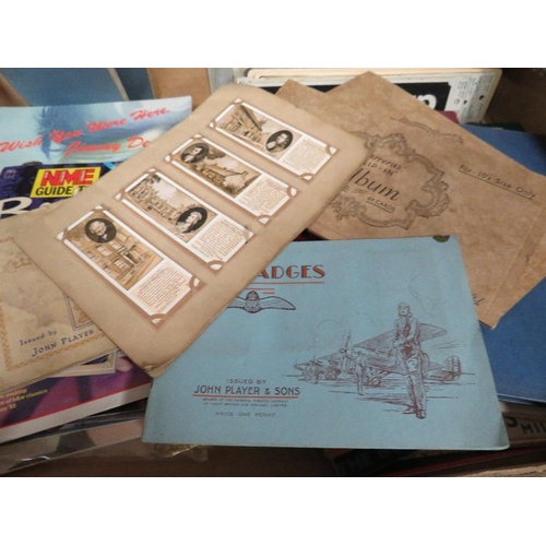 112A - A TRAY OF ASSORTED EPHEMERA / COLLECTABLES TO INCLUDE VINTAGE SEWING PATTERNS, SIGNS, MAGAZINES, ETC