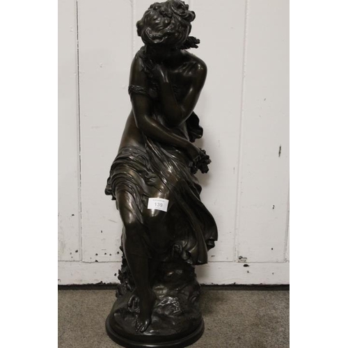 139 - A LARGE BRONZE EFFECT MODEL OF A SEATED LADY