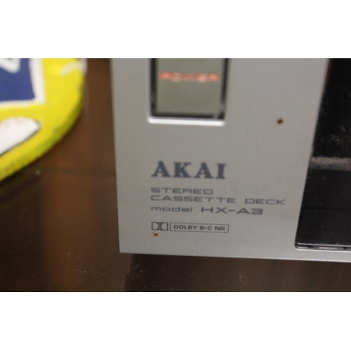 149 - AN AKAI STEREO CASSETTE DECK