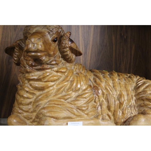 189 - A CARVED WOODEN MODEL OF A RECUMBENT RAM