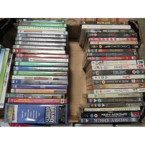 57 - A TRAY CONTAINING A SELECTION OF NEW AND SEALED DVDS, RAILWAY THEMED DVDS AND FOUR STAR TREK BOX SET... 