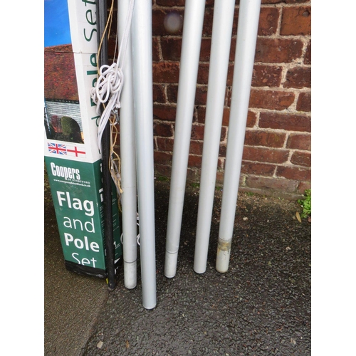 605 - A COOPERS OF STORTFORD 20FT ALUMINIUM FLAG POLE - NO FLAGS