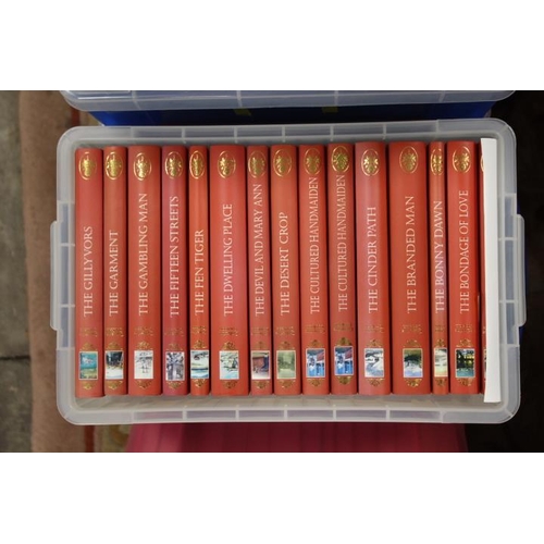 65 - A LARGE COLLECTION OF CATHERINE COOKSON BOOKS CONTAINED IN EIGHT SMALL STORAGE BOXES