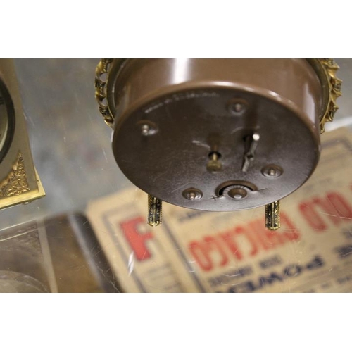 210 - A CASED BRASS DAVID PETERSON CARRIAGE CLOCK TOGETHER WITH TWO OTHER CLOCKS (3)