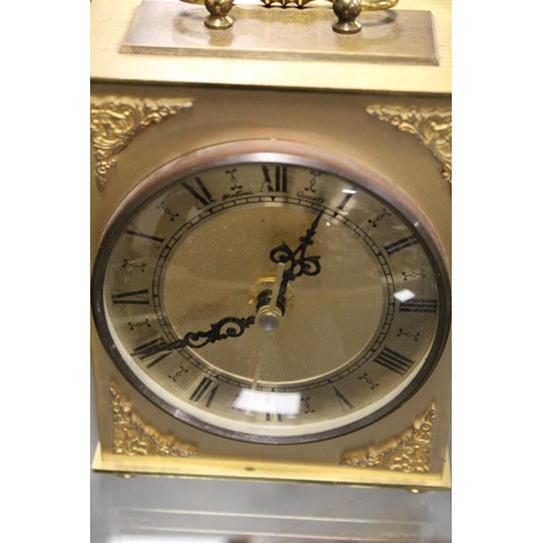 210 - A CASED BRASS DAVID PETERSON CARRIAGE CLOCK TOGETHER WITH TWO OTHER CLOCKS (3)