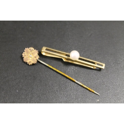 265 - A 9CT GOLD CHESTER HALLMARKED STICK PIN TOGETHER WITH A PLATED EXAMPLE (2)