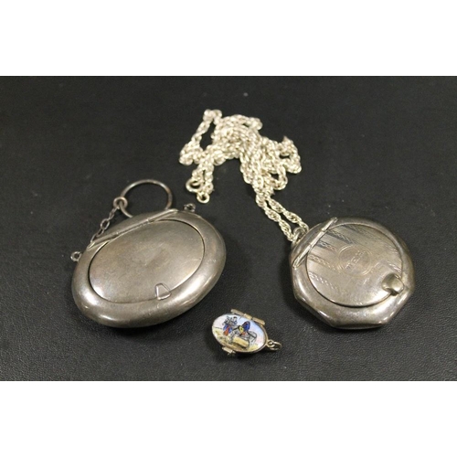 279 - TWO HALLMARKED SILVER POWDER / SNUFF PENDANTS - A/F, TOGETHER WITH A SMALL ENAMELLED 'BASKET' CHARM ... 