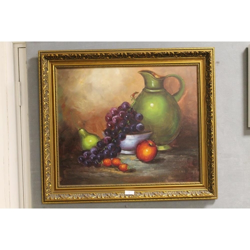 7 - A GILT FRAMED OIL ON CANVAS STILL LIFE STUDY OF A BOWL, FRUIT AND JUG ON A TABLE