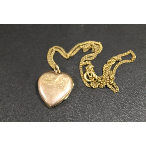 295 - A 9CT GOLD BACK AND FRONT LOCKET ON CHAIN