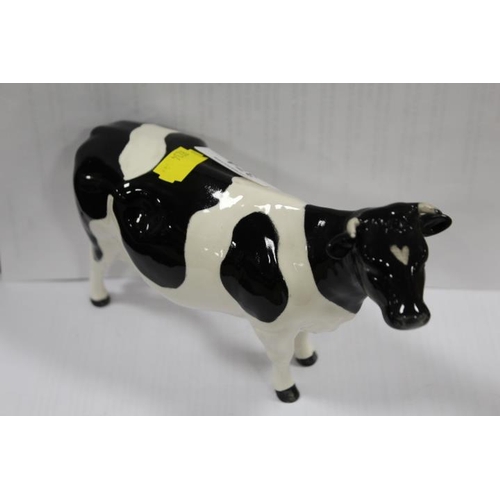 374 - A BESWICK FRIESIAN COW 'CLAYBURY LEEG WATER'