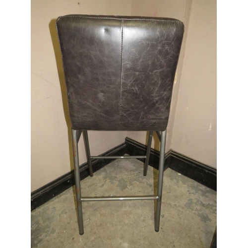 708 - A MODERN LEATHER BAR STOOL