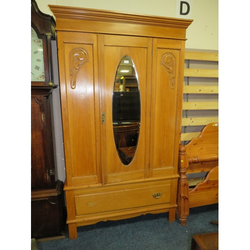 715 - AN EDWARDIAN SATINWOOD WARDROBE