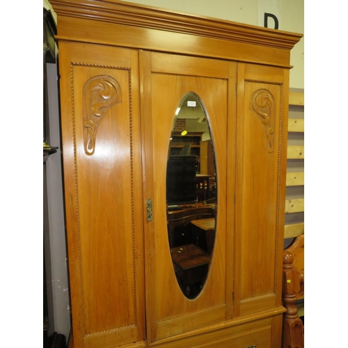 715 - AN EDWARDIAN SATINWOOD WARDROBE