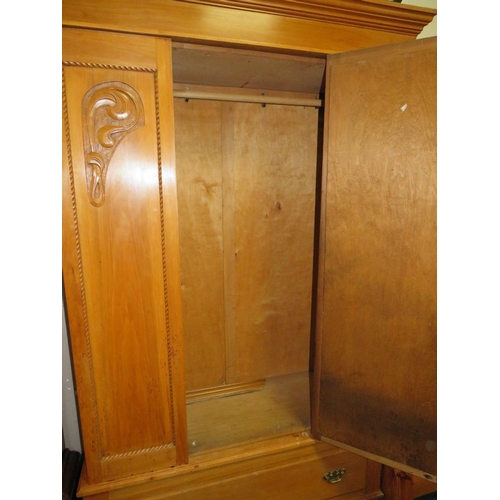 715 - AN EDWARDIAN SATINWOOD WARDROBE