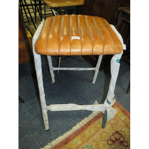 737 - A MODERN TAN LEATHER STOOL