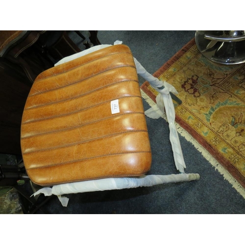 737 - A MODERN TAN LEATHER STOOL