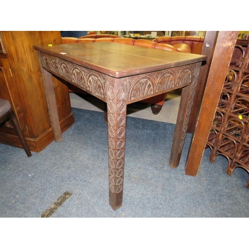 740 - AN ANTIQUE OAK CARVED SIDE TABLE W-92 CM