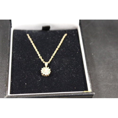 321 - HALLMARKED 9CT GOLD DIAMOND AND EMERALD PENDANT NECKLACE