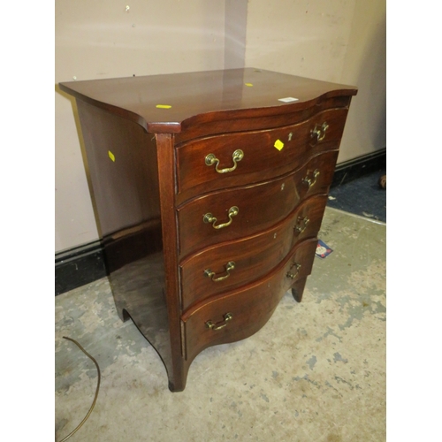 759 - A 20TH CENTURY MAHOGANY SMALL SERPENTINE CHEST OF FOUR DRAWERS W-60 CM H-74 CM