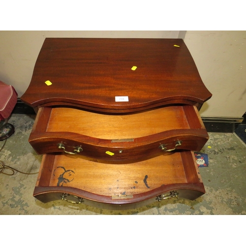 759 - A 20TH CENTURY MAHOGANY SMALL SERPENTINE CHEST OF FOUR DRAWERS W-60 CM H-74 CM