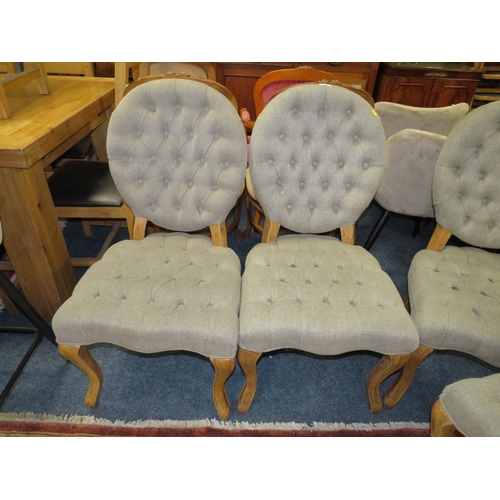 770 - A SET OF FOUR MODERN UPHOLSTERED GREY DINING CHAIRS