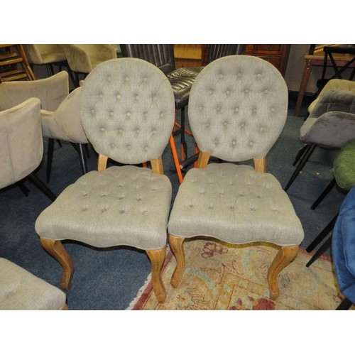 770 - A SET OF FOUR MODERN UPHOLSTERED GREY DINING CHAIRS