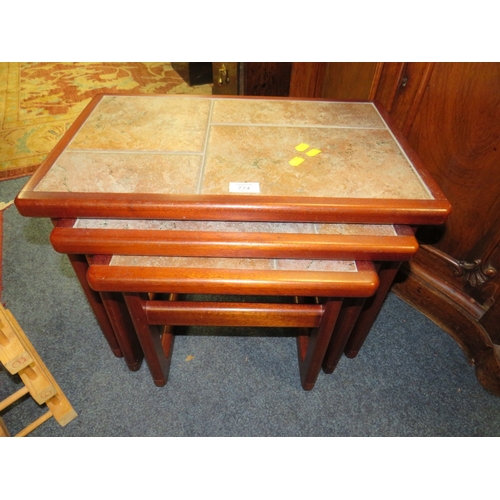 774 - A MID CENTURY TILE TOP NEST OF TABLE TOGETHER WITH A STOOL AND A WINE RACK (3)