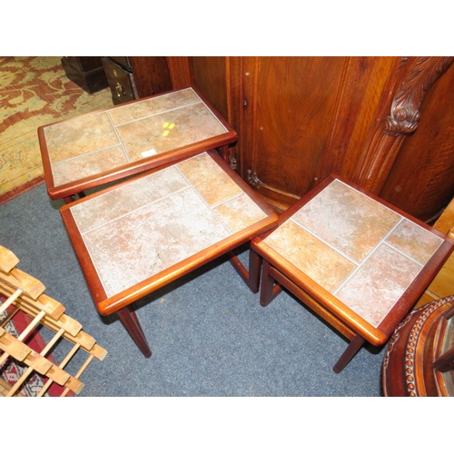 774 - A MID CENTURY TILE TOP NEST OF TABLE TOGETHER WITH A STOOL AND A WINE RACK (3)