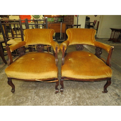 780 - A PAIR OF EDWARDIAN UPHOLSTERED TUB CHAIRS