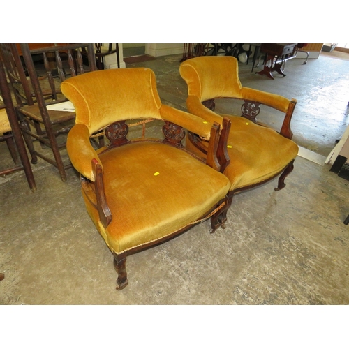 780 - A PAIR OF EDWARDIAN UPHOLSTERED TUB CHAIRS