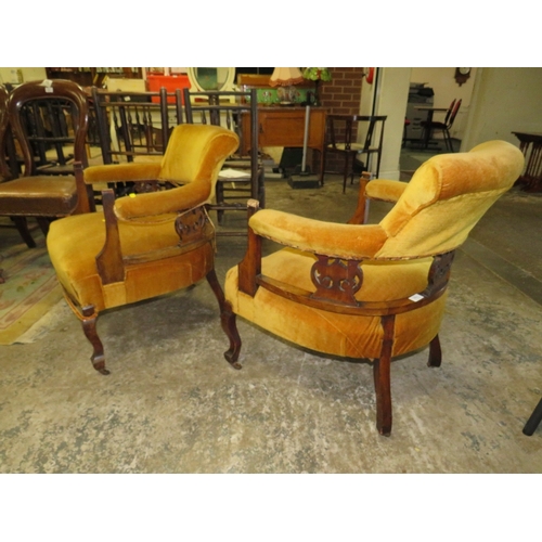 780 - A PAIR OF EDWARDIAN UPHOLSTERED TUB CHAIRS