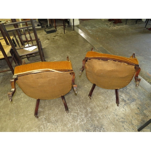 780 - A PAIR OF EDWARDIAN UPHOLSTERED TUB CHAIRS