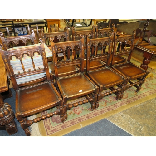 784 - A SET OF TEN JACOBEAN STYLE OAK DINING CHAIRS