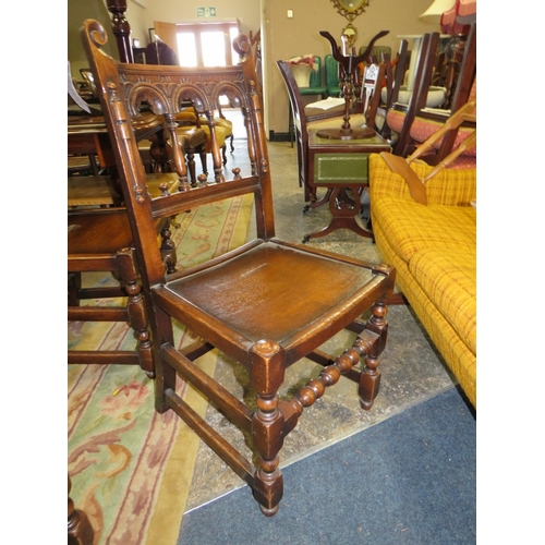 784 - A SET OF TEN JACOBEAN STYLE OAK DINING CHAIRS