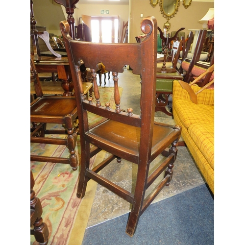 784 - A SET OF TEN JACOBEAN STYLE OAK DINING CHAIRS