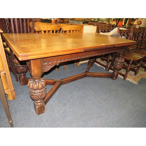 785 - A LARGE OAK JACOBEAN STYLE DRAWLEAF TABLE - W 182 CM EXTENDING TO APPROX W 302 CM