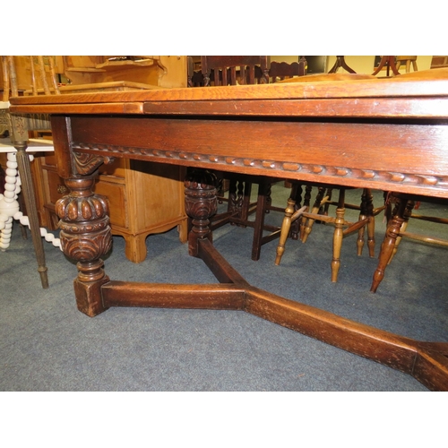 785 - A LARGE OAK JACOBEAN STYLE DRAWLEAF TABLE - W 182 CM EXTENDING TO APPROX W 302 CM