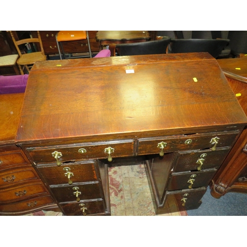 791 - AN ANTIQUE OAK TWIN PEDESTAL DESK - W 94 CM