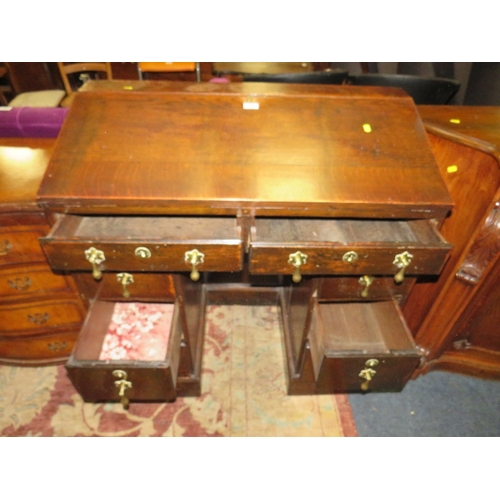 791 - AN ANTIQUE OAK TWIN PEDESTAL DESK - W 94 CM