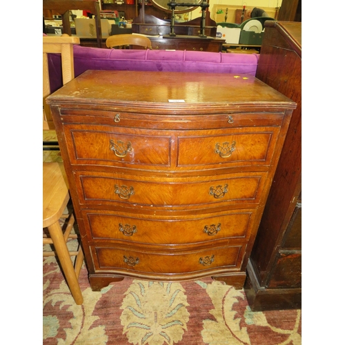 792 - A REPRODUCTION WALNUT SERPENTINE CHEST OF FIVE DRAWERS - W 63 CM A/F