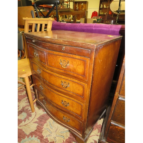 792 - A REPRODUCTION WALNUT SERPENTINE CHEST OF FIVE DRAWERS - W 63 CM A/F