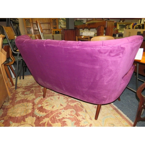 799 - A MODERN PURPLE SHAPED TWO SEATER SOFA