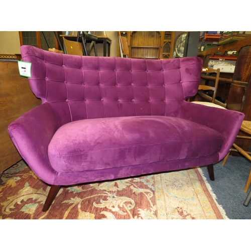 799 - A MODERN PURPLE SHAPED TWO SEATER SOFA