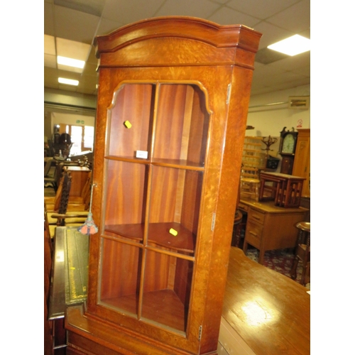 801 - A REPRODUCTION WALNUT CORNER CABINET